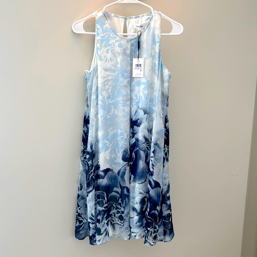 Blue floral pattern Calvin Klein dress. Never worn. Size 6